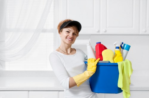 Cleaner using safe practices with cleaning supplies