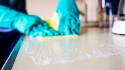 Local cleaning team working in a Tjohnswood workplace